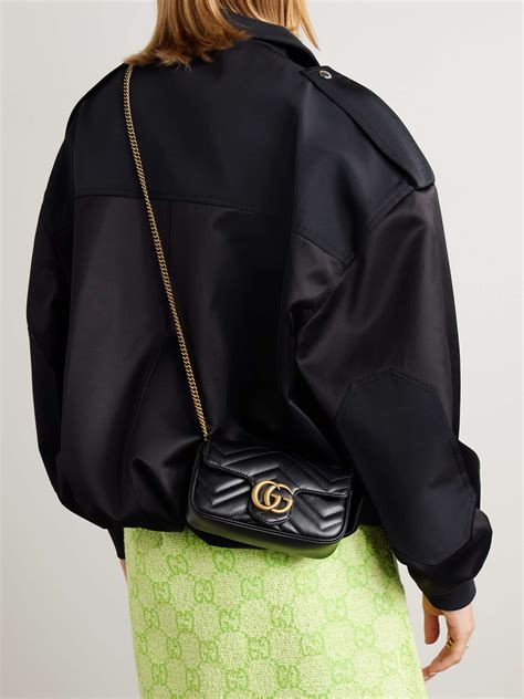 gucci marmont super mini schwarz|Gucci Marmont mini quilted bag.